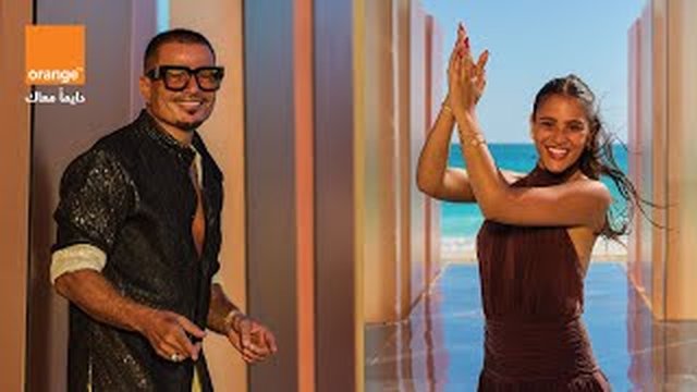 Thumbnail de Amr Diab & Orange - Khatfoony (Official Music Video) |  عمرو دياب واورنچ - خطفوني (الكليب الرسمي)